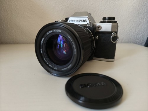 Olympus sigma 35 70mm - om-10,